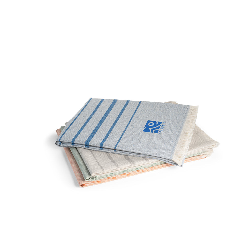 Caplan. Multifunctional Towel Made Of Light And Resistant Cotton (90%) And Recycled Cotton (10%)