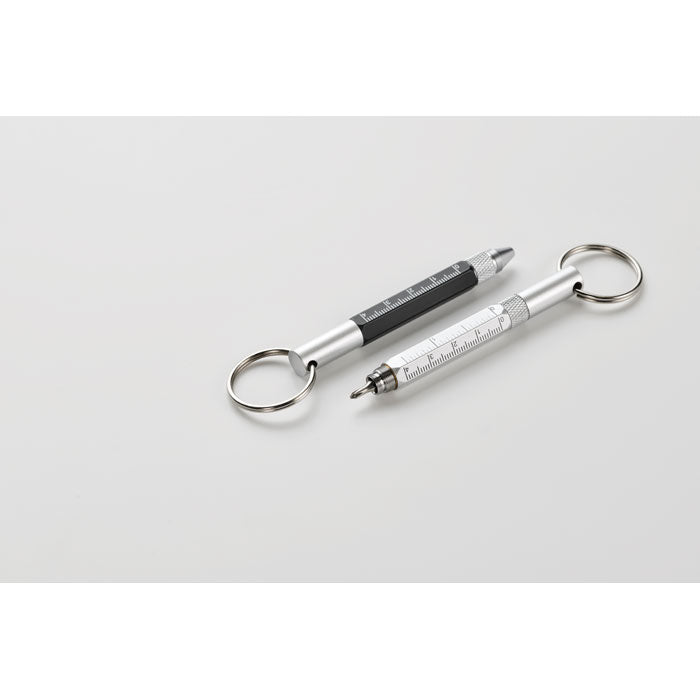 Key ring with twist action pen